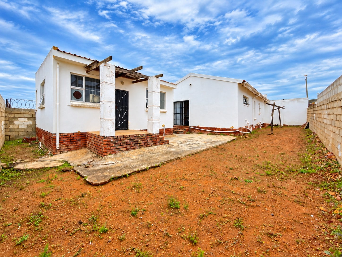 Charming Two Bedroom Hillside Home With One Point Five Bathrooms And Garage