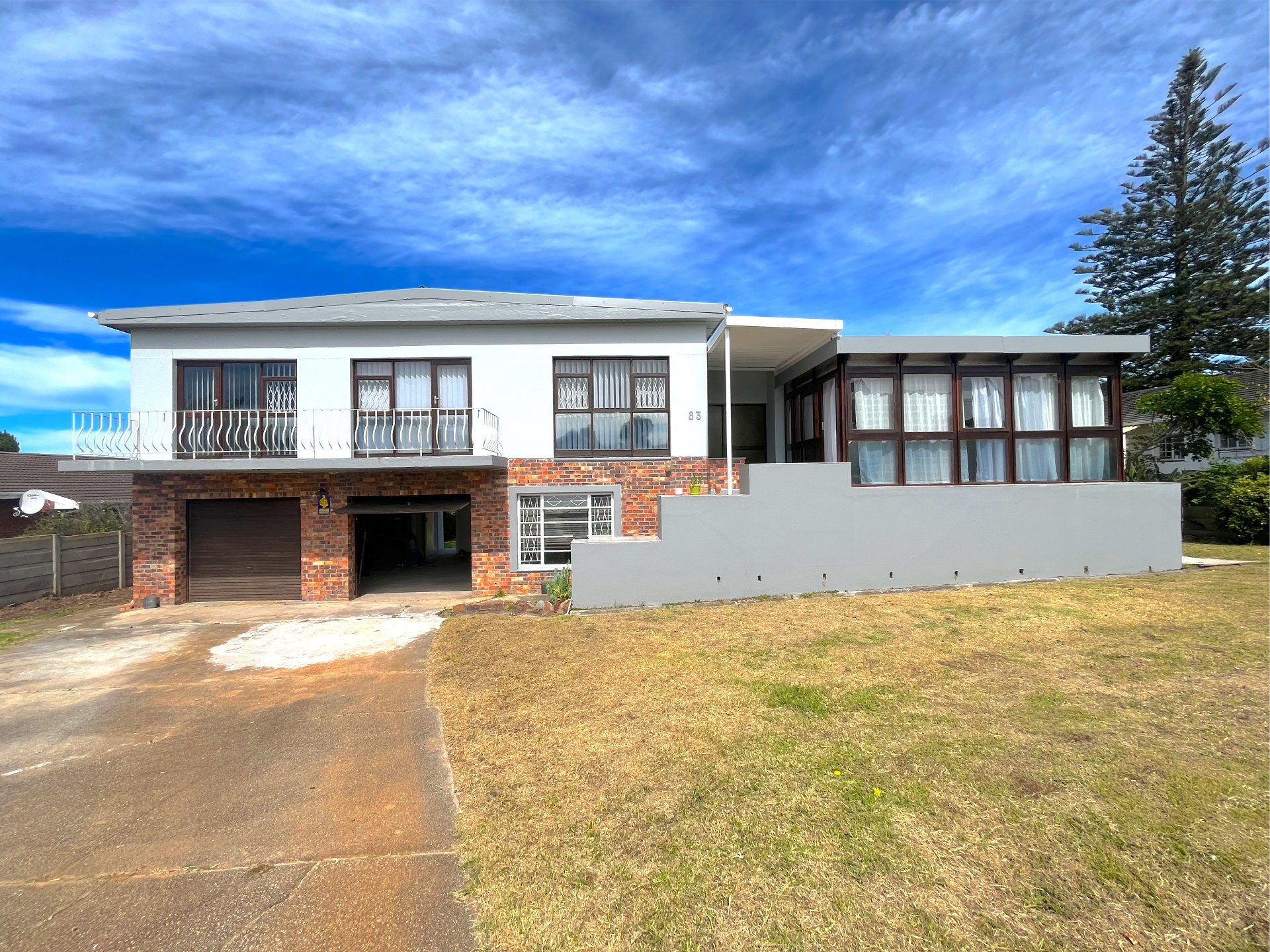 Spacious Family Home with Exceptional Potential in Sunridge Park