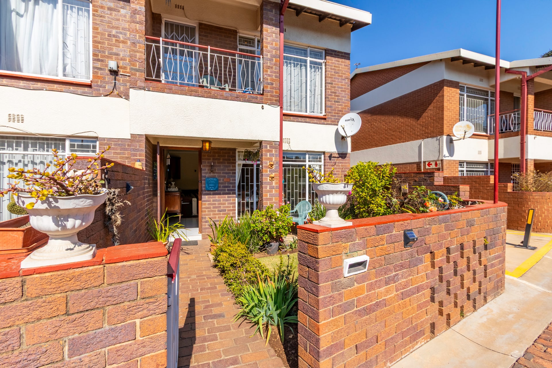 Spacious 2-Bedroom Townhouse with Garden and Double Garage in Secure Complex