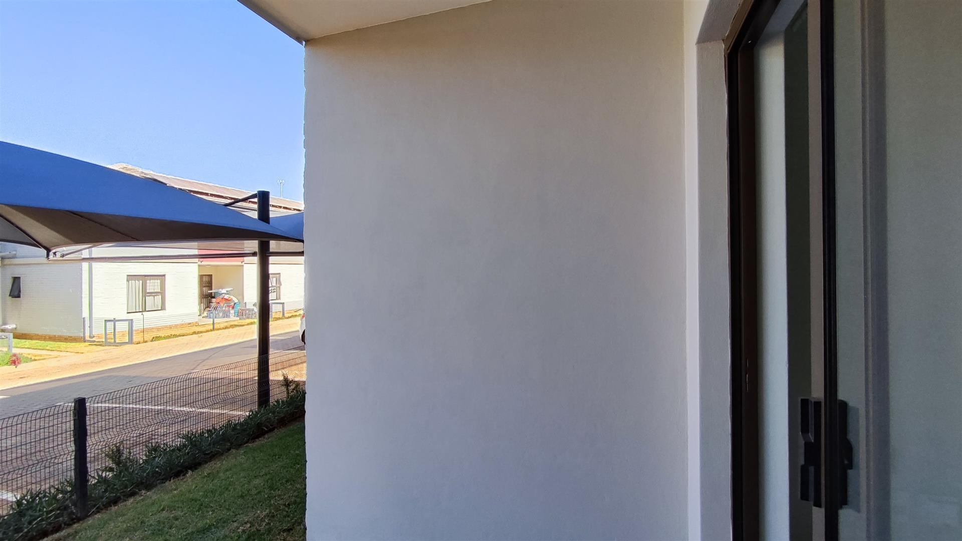 Neat 2 Bedroom Unit with Pool in Secure Complex