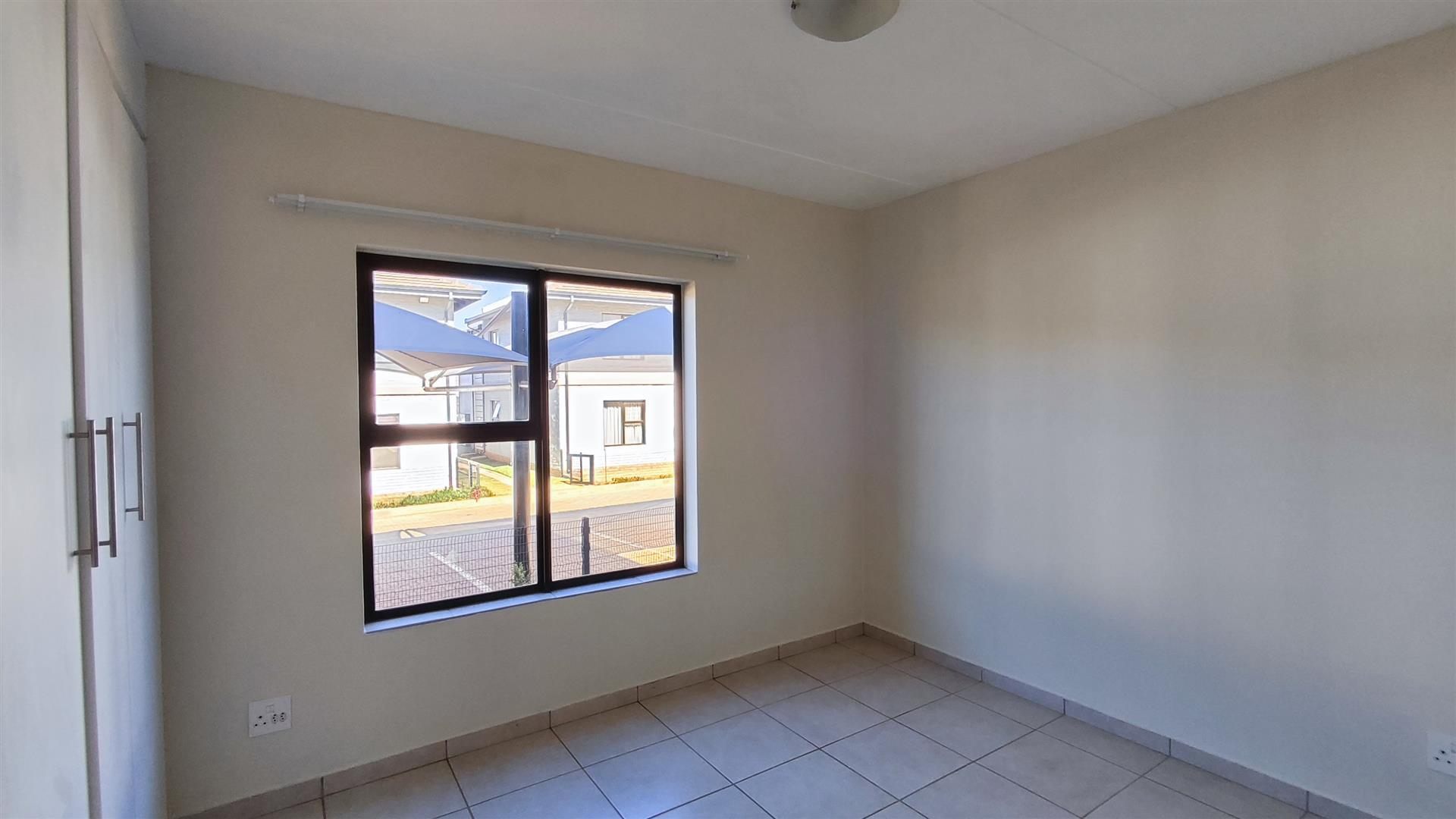 Neat 2 Bedroom Unit with Pool in Secure Complex