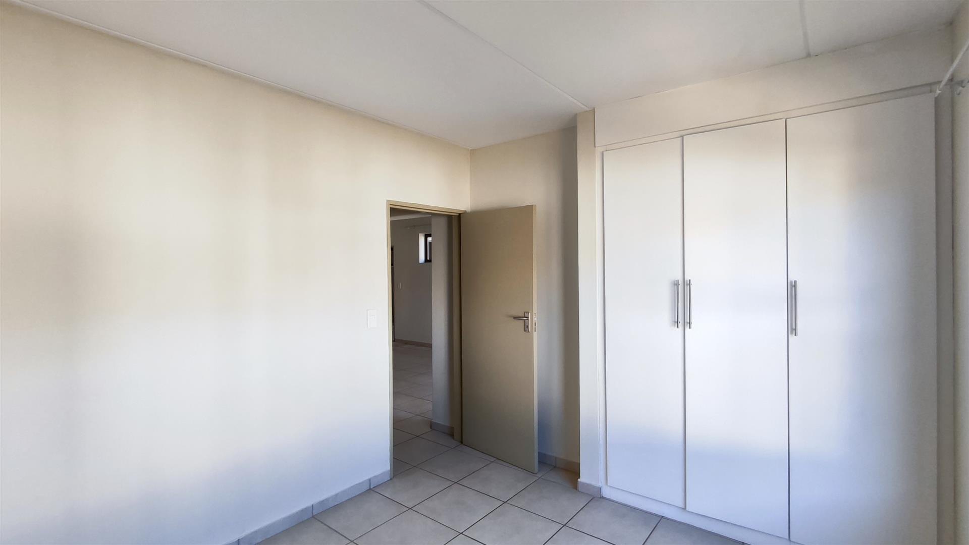 Neat 2 Bedroom Unit with Pool in Secure Complex