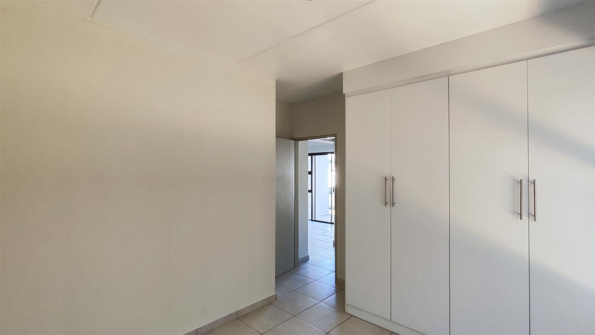 Neat 2 Bedroom Unit with Pool in Secure Complex