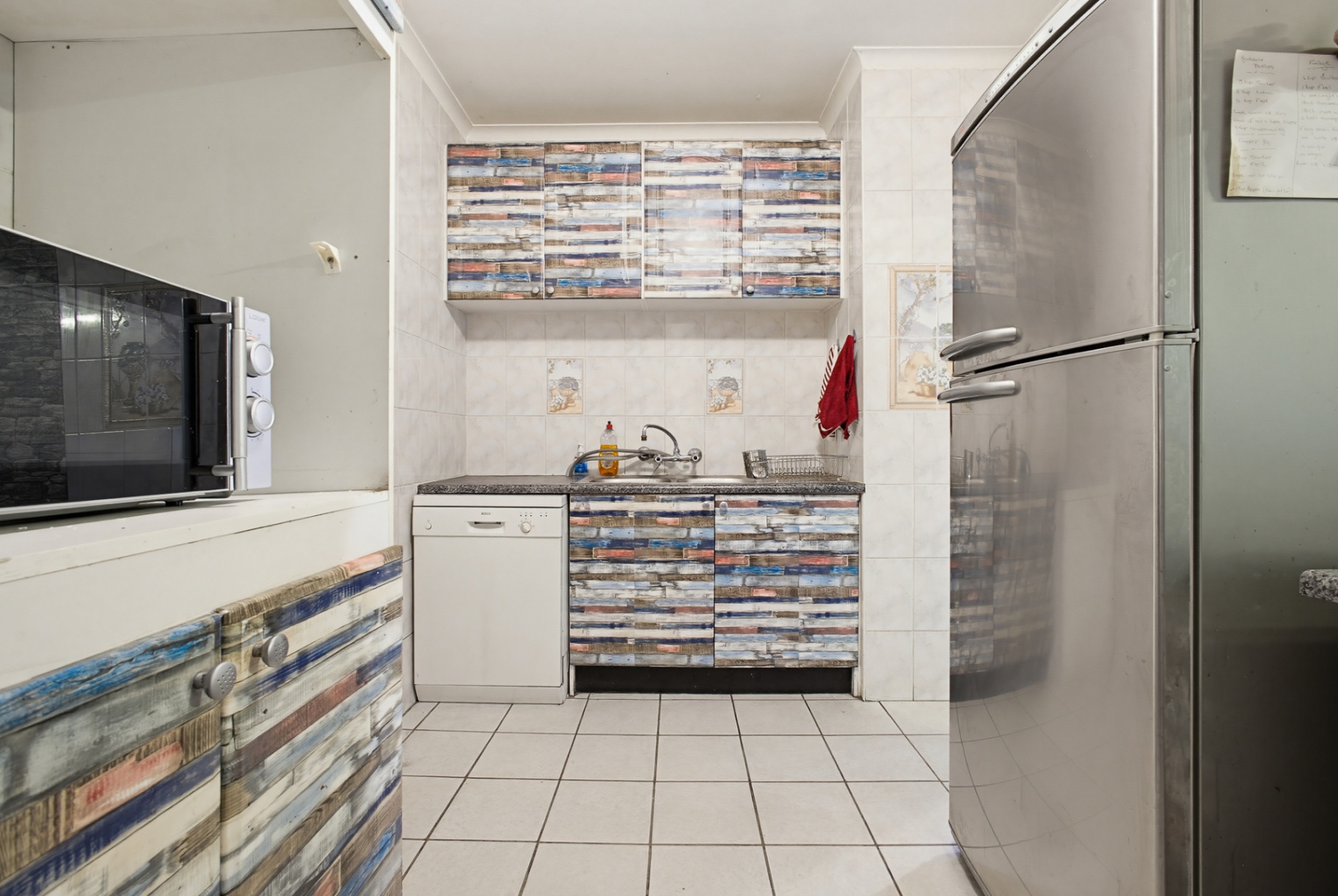 Neat 4 Bedroom Home with Flat Potential in Rhodesfield