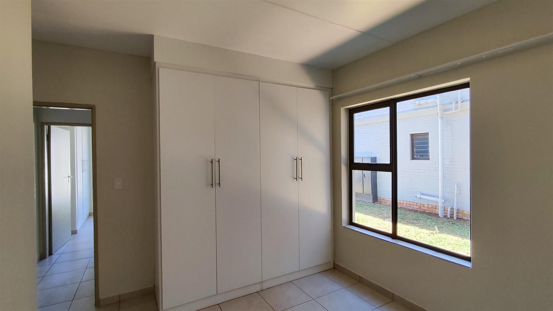 Neat 2 Bedroom Unit with Pool in Secure Complex