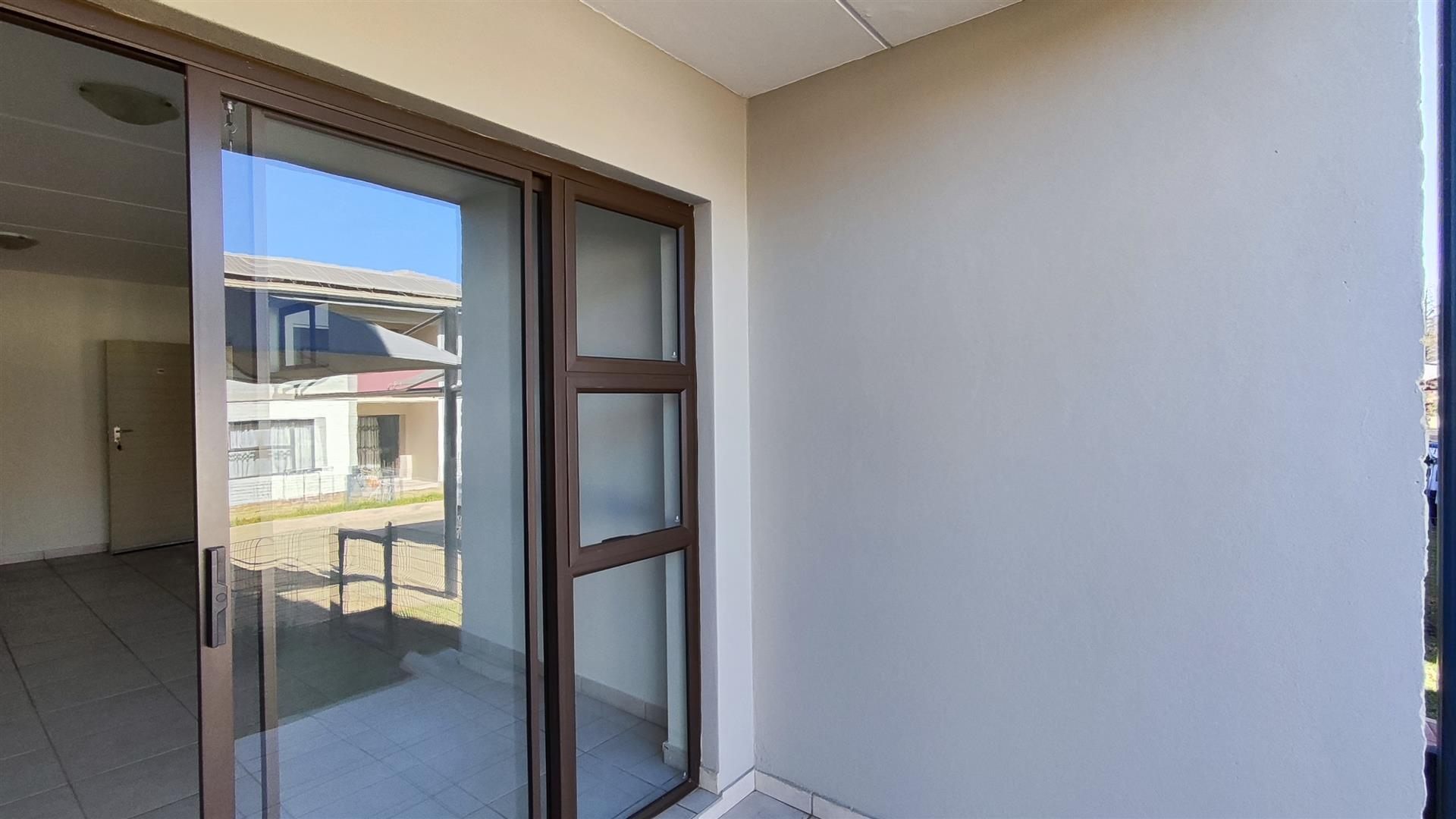 Neat 2 Bedroom Unit with Pool in Secure Complex