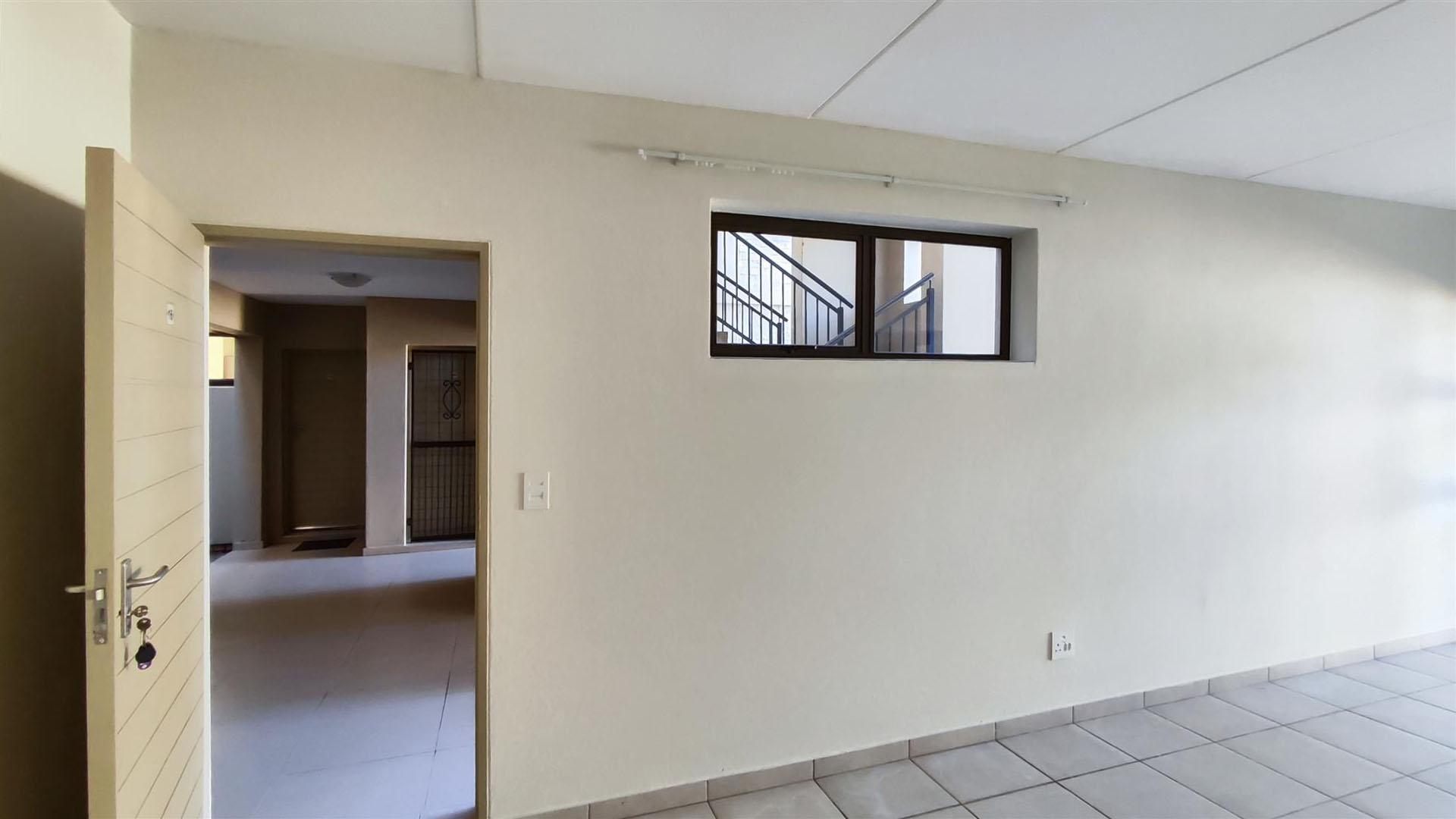 Neat 2 Bedroom Unit with Pool in Secure Complex