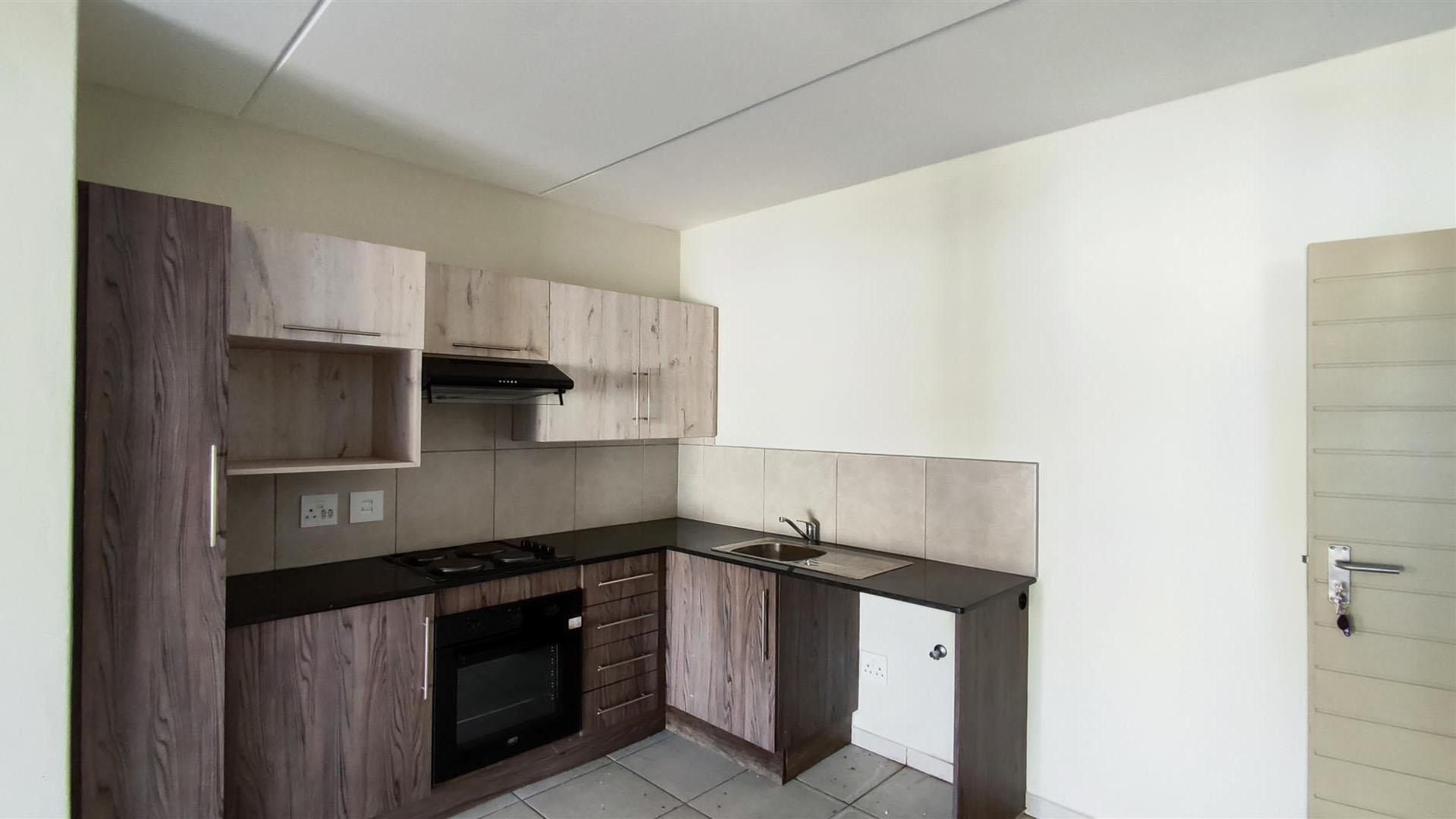 Neat 2 Bedroom Unit with Pool in Secure Complex