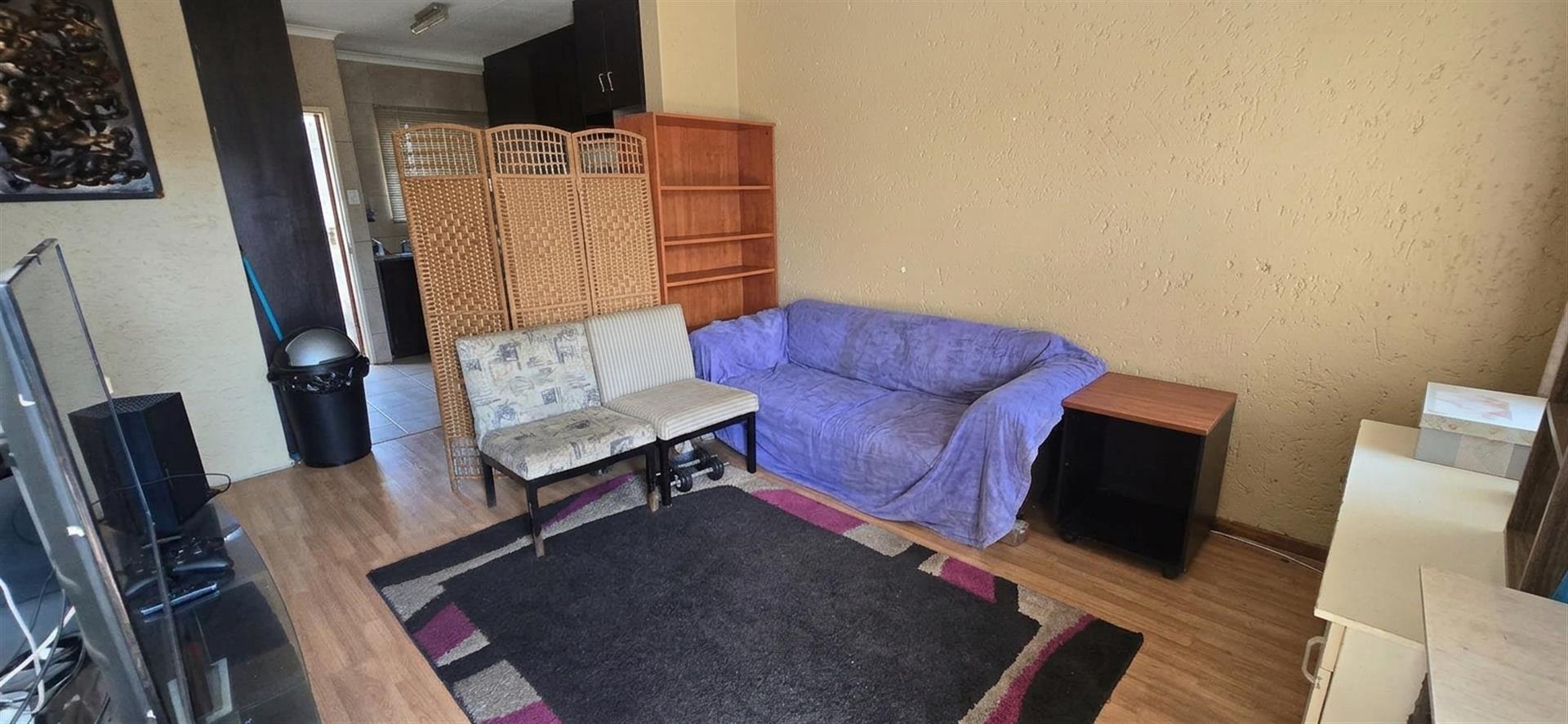 Neat Upstairs Unit in Secure Complex