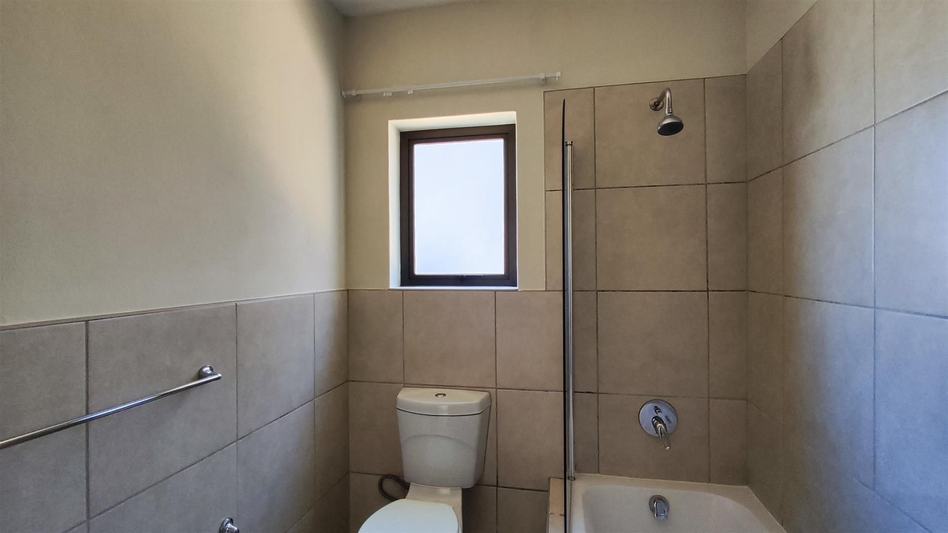 Neat 2 Bedroom Unit with Pool in Secure Complex