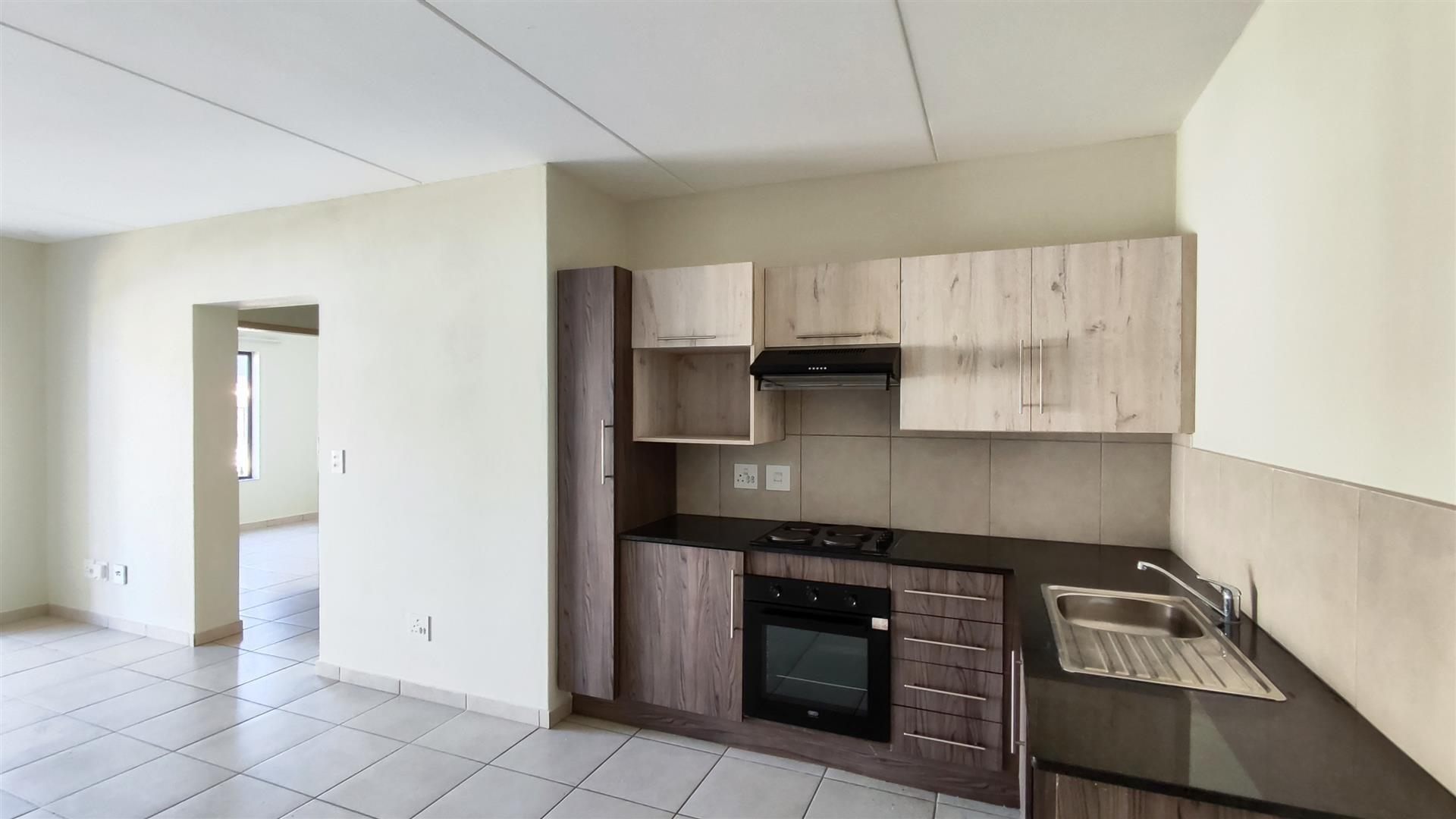 Neat 2 Bedroom Unit with Pool in Secure Complex