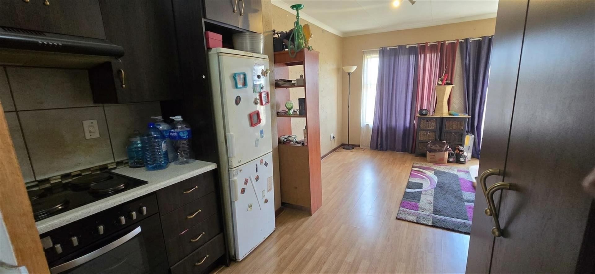 Neat Upstairs Unit in Secure Complex