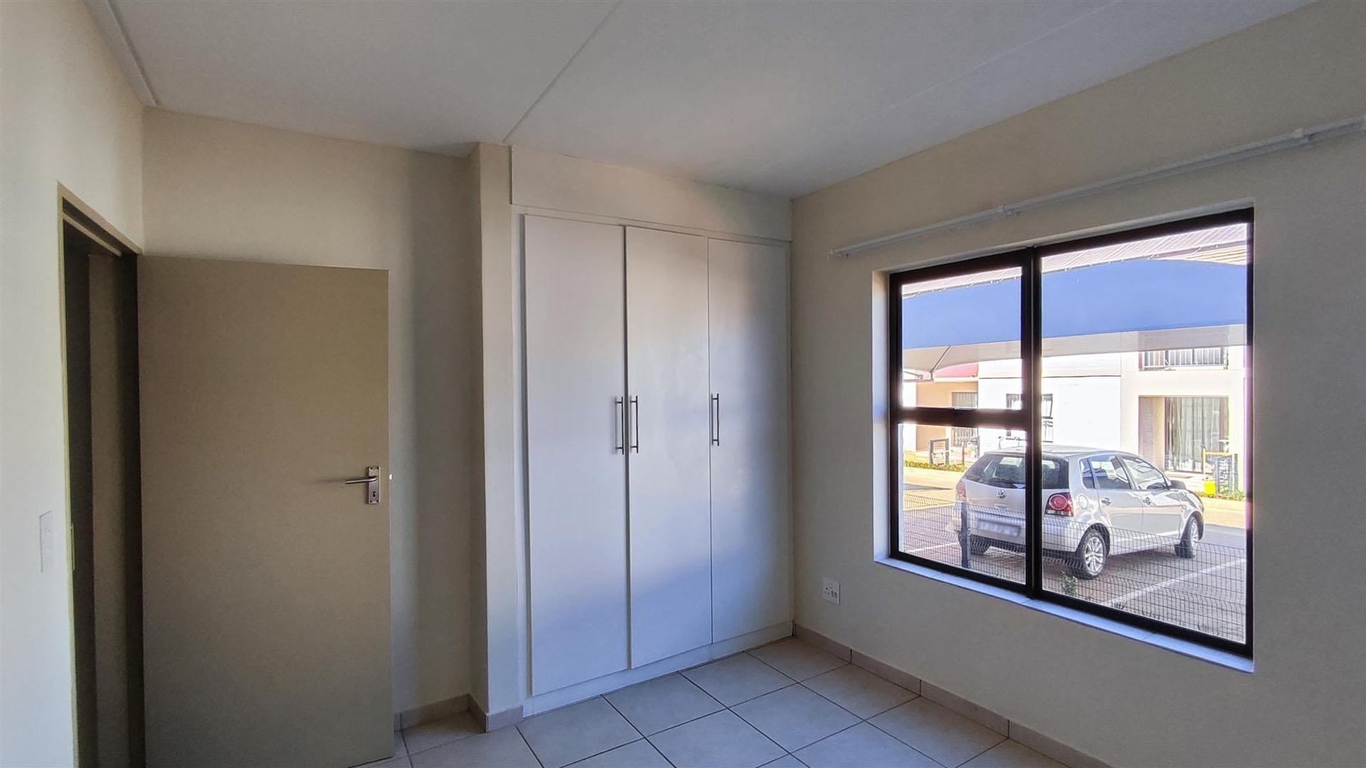 Neat 2 Bedroom Unit with Pool in Secure Complex