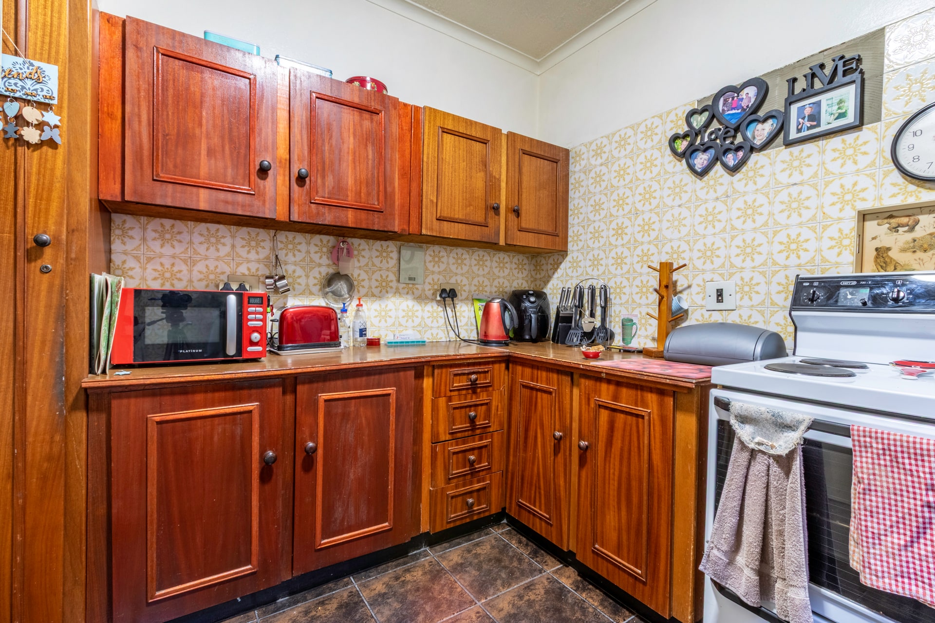 Spacious 2-Bedroom Townhouse with Garden and Double Garage in Secure Complex