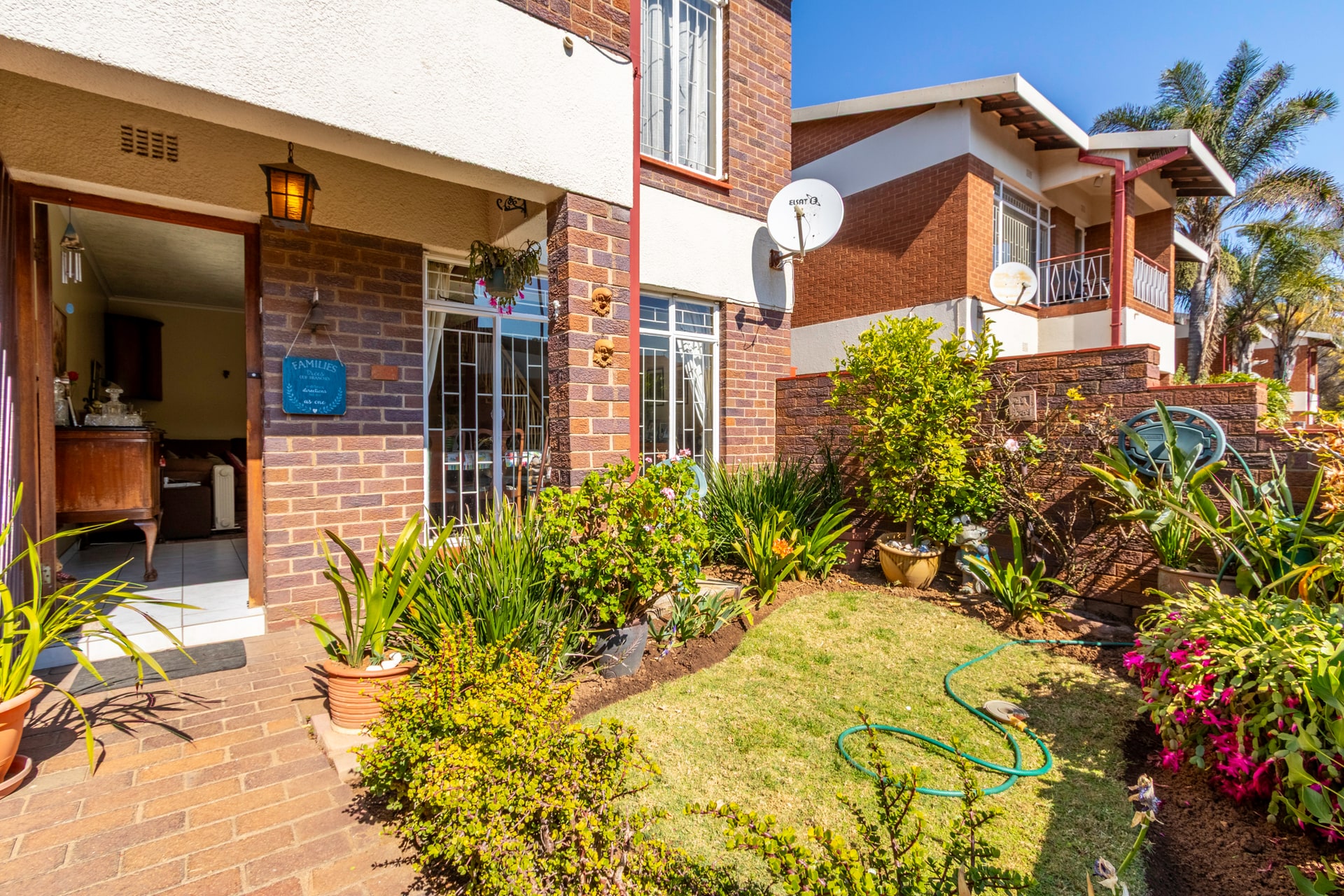 Spacious 2-Bedroom Townhouse with Garden and Double Garage in Secure Complex