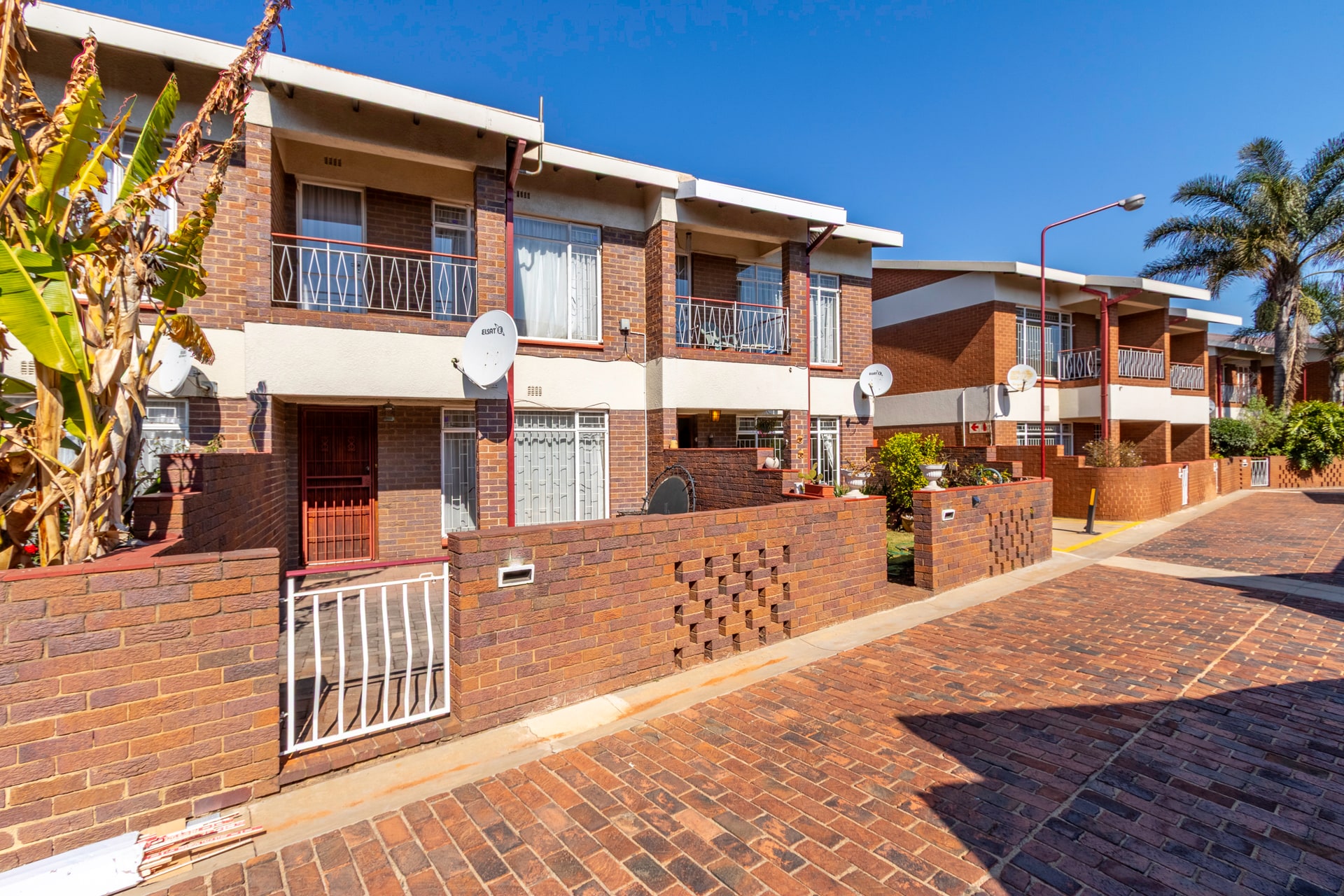 Spacious 2-Bedroom Townhouse with Garden and Double Garage in Secure Complex