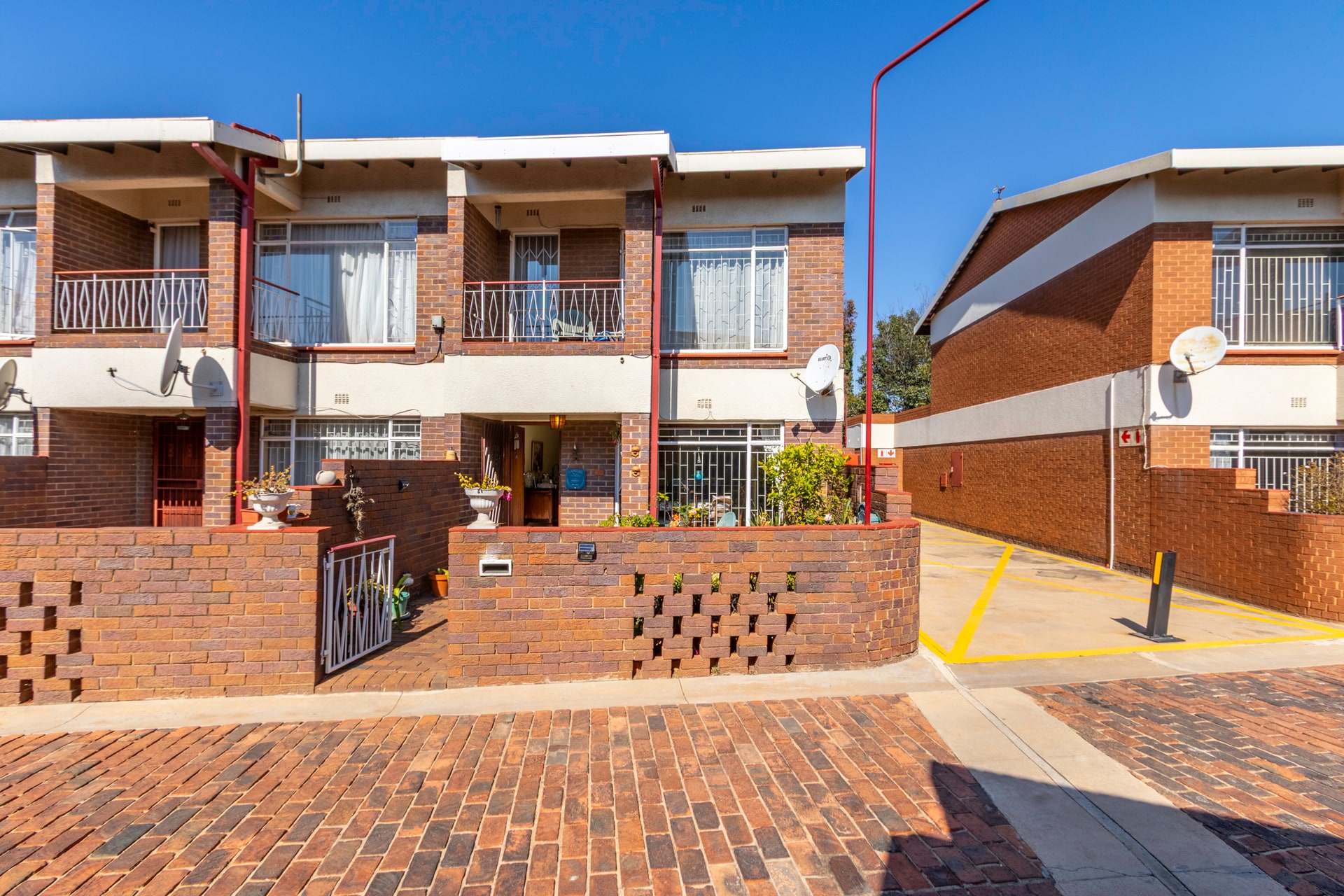 Spacious 2-Bedroom Townhouse with Garden and Double Garage in Secure Complex